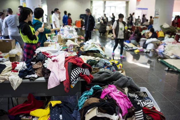 Earthquakes aftermath in Japan KUMAMOTO, JAPAN - APRIL 21: Volunteers help organize the clothes for victims of earthquake in the morning at Mashiki Gymnasium Evacuation Center in Kumamoto, Japan on April 21, 2016 . To date 45 people are confirmed dead and around 11,000 people have evacuated after an 6.5 earthquake on Thursday night and a stronger 7.3 quake on Saturday morning struck the Kyushu Island in Western Japan. Kumamoto Japan. Editorial use only. Please get in touch for any other usage.  Copyright: x2025xAnadoluxRichardxAtreroxdexGuzmanx