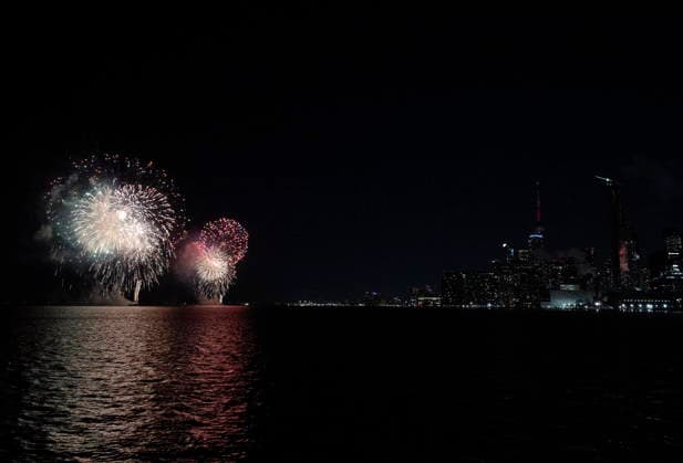 January 1, 2026, Toronto, On, Canada: Revellers watch as fireworks light up Toronto s inner harbour to ring in the New Year, on Thursday, Jan. 1, 2026. Toronto Canada  - ZUMAc35_ 20260101_zaf_c35_001 Copyright: xJonxBlackerx