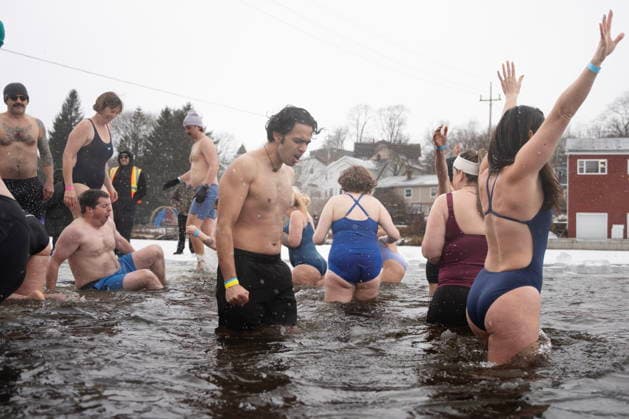 January 1, 2026, Dartmouth, Ns, Canada: People react to entering the ice-filled water in Lake Banook during the annual polar bear swim on New Year s Day in Dartmouth, N.S., Thursday, Jan. 1, 2026. Dartmouth Canada  - ZUMAc35_ 20260101_zaf_c35_018 Copyright: xDarrenxCalabresex