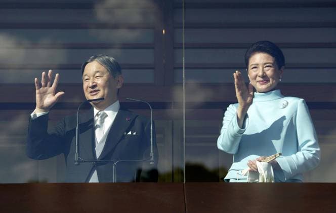 New Year greeting event at Japan s Imperial Palace Japanese Emperor Naruhito and Empress Masako wave to well-wishers from a balcony at the Imperial Palace in Tokyo during a New Year greeting event on Jan. 2, 2026.  A14AA0005146511P