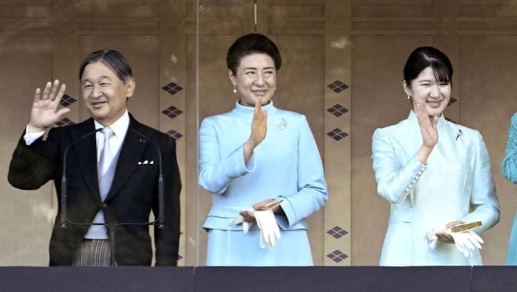 New Year greeting event at Japan s Imperial Palace Japanese Emperor Naruhito, Empress Masako (C) and their daughter Princess Aiko wave to well-wishers from a balcony at the Imperial Palace in Tokyo during a New Year greeting event on Jan. 2, 2026.  A14AA0005146733P