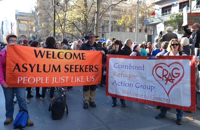 World Refugee Day in Melbourne MELBOURNE, AUSTRALIA - JUNE 21: People hold banners as they gather to mark World Refugee Day in Melbourne, Australia on June 21, 2015. Queensland Australia. Editorial use only. Please get in touch for any other usage.  Copyright: x2025xAnadoluxRecepxÅžakarx