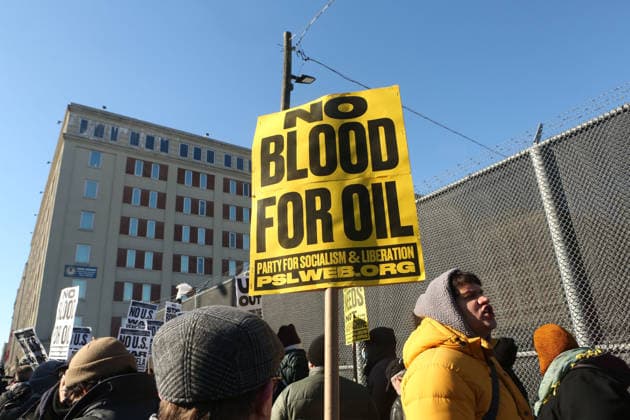 January 4, 2026, Brooklyn, New York, USA: A sign reads No Blood for Oil . Anti-war and Anti-Trump protestors picket in front of Metropolitan Detention Center (MDC) in Brooklyn, New York. Nicolas Maduro, the ousted President of Venezuela, is being held at the Metropolitan Detention Center (MDC) in Brooklyn, New York, following a dramatic US military operation to capture him and his wife from their home in Caracas. They arrived on Saturday night early Sunday morning to face charges, prompting international reactions and protests, particularly as the MDC is a notorious federal facility. Brooklyn USA - ZUMAk45_ 20260104_zaf_k45_040 Copyright: xKristaxKennellx
