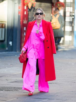 Ashley Roberts in pink outfit and a red coat as she leaves Global Radio after her 1st Day back after the festive holiday Featuring: Ashley Roberts Where: London, United Kingdom When: 05 Jan 2026 Credit: Richard Lincoln Cover Images EDITORIAL USE ONLY. NOT FOR USE BY NEWSPAPERS BASED IN THE UK. Copyright: xRichardxlincolnx coverimg55362385