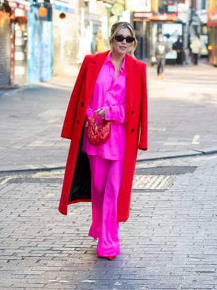 Ashley Roberts in pink outfit and a red coat as she leaves Global Radio after her 1st Day back after the festive holiday Featuring: Ashley Roberts Where: London, United Kingdom When: 05 Jan 2026 Credit: Richard Lincoln Cover Images EDITORIAL USE ONLY. NOT FOR USE BY NEWSPAPERS BASED IN THE UK. Copyright: xRichardxlincolnx coverimg55362387