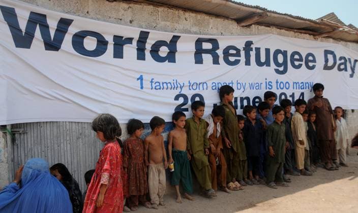 World Refugee Day ISLAMABAD, PAKISTAN - JUNE 20: Afghan refugee children stand outside a free medical camps and free eye camp organized by United Nations Refugee Agency (UNHCR) on the eve of World Refugee Day on June 20, 2014, in Islamabad, Pakistan. Each year on June 20th the United Nations, UNHCR and civil groups around the world celebrate World Refugee Day in order to draw the public s attention to the millions of refugees and Internally displaced persons worldwide who have been forced to flee their homes due to war, conflict and persecution. Islamabad Pakistan. Editorial use only. Please get in touch for any other usage.  Copyright: x2025xAnadoluxMuhammedxRezax