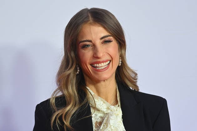 Cathy HUMMELS (FISCHER), lacht,lachen,lachend,optimistisch,gutgelaunt, Einzelbild,angeschnittenes Einzelmotiv,Portraet,Portrait,Porträt. Premiere EXTRAWURST am 08.01.2026 im Mathaeser Kino in Muenchen.