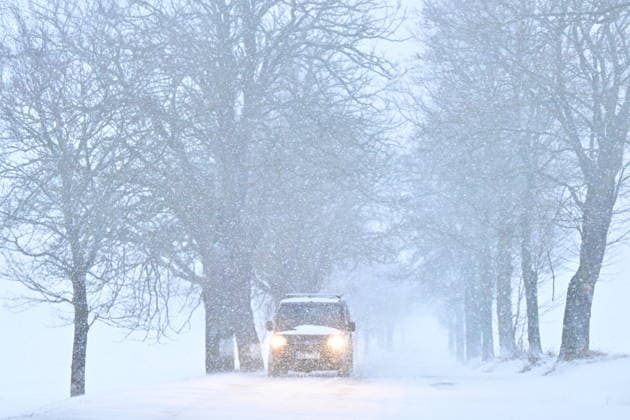 A car on a snowy road near Trhove Sviny, Czech Republic, on January 9, 2026. (CTKxPhoto VaclavxPancer) CTKPhotoP2026010902827  CTKPhotoP2026010902827