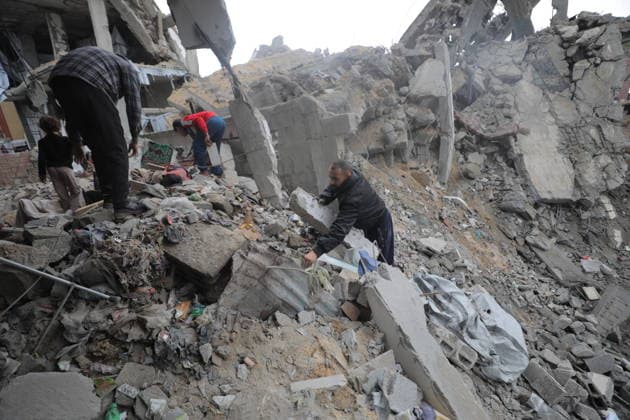 The Israeli army attacks the Bureij Camp in Gaza GAZA CITY, GAZA - JANUARY 9: Palestinians search for their belongings among the rubble after Israeli army attacks destroyed a building at the Bureij Camp in the northern Gaza Strip on January 9, 2026. The attack completely demolished the building and caused damage to surrounding structures. Hassan Jedi Anadolu Gaza City Gaza. Editorial use only. Please get in touch for any other usage.  Copyright: x2026xAnadoluxHassanxJedix
