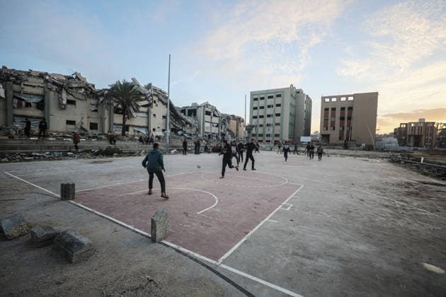 Displaced Palestinian youths play football on a destroyed pitch inside the devastated Islamic University in central Gaza City Displaced Palestinian youths play football on a destroyed pitch inside the devastated Islamic University in central Gaza City on January 10, 2026, trying to find moments of normalcy amidst the ongoing destruction and conflict in the Gaza Strip. Photo by Omar Ashtawy apaimages Gaza city Gaza Strip Palestinian Territory 100126_Gaza_OSH_00(21) Copyright: xapaimagesxOmarxAshtawyx xapaimagesx