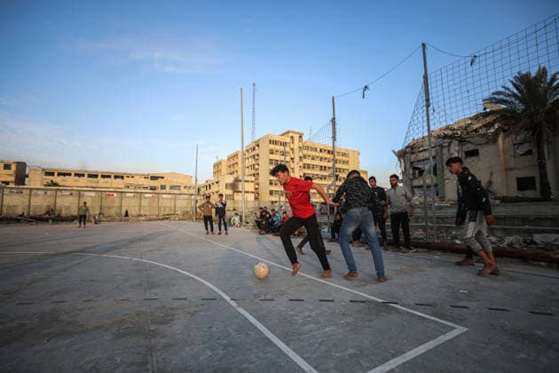 Displaced Palestinian youths play football on a destroyed pitch inside the devastated Islamic University in central Gaza City Displaced Palestinian youths play football on a destroyed pitch inside the devastated Islamic University in central Gaza City on January 10, 2026, trying to find moments of normalcy amidst the ongoing destruction and conflict in the Gaza Strip. Photo by Omar Ashtawy apaimages Gaza city Gaza Strip Palestinian Territory 100126_Gaza_OSH_00(10) Copyright: xapaimagesxOmarxAshtawyx xapaimagesx