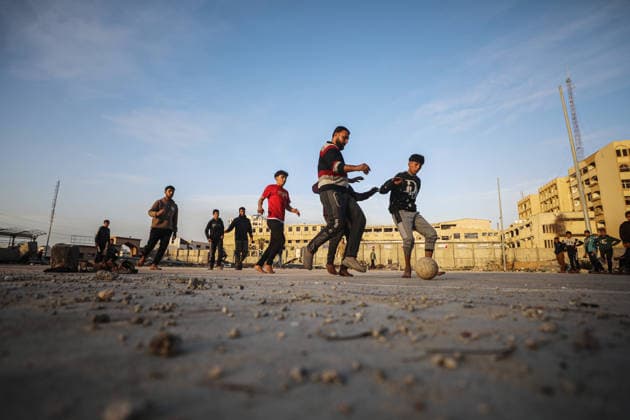 Displaced Palestinian youths play football on a destroyed pitch inside the devastated Islamic University in central Gaza City Displaced Palestinian youths play football on a destroyed pitch inside the devastated Islamic University in central Gaza City on January 10, 2026, trying to find moments of normalcy amidst the ongoing destruction and conflict in the Gaza Strip. Photo by Omar Ashtawy apaimages Gaza city Gaza Strip Palestinian Territory 100126_Gaza_OSH_00(12) Copyright: xapaimagesxOmarxAshtawyx xapaimagesx