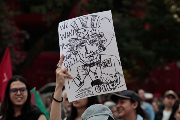 January 10, 2026, Mexico City, Cdmx, Mexico: Mexican protesters and social organizations are demonstrating against the actions of US President DONALD TRUMP against Venezuela and its former president, NICOLAS MADURO. With posters, giant banners, and Venezuelan flags, they are showing their support for MADURO and his vice president, DELCY RODRIGUEZ, who has assumed the presidency due to the country s situation. Chanting slogans like Yankees out of Latin America and Trump, imperialist terrorist, the protesters are demanding the immediate release of NICOLAS MADURO, whom they claim is being held captive by DONALD TRUMP. This comes as protests against these actions spread worldwide, with many believing TRUMP S true objective is to seize V - ZUMAp204 20260110_zip_p204_013 Copyright: xJosuexPerezx