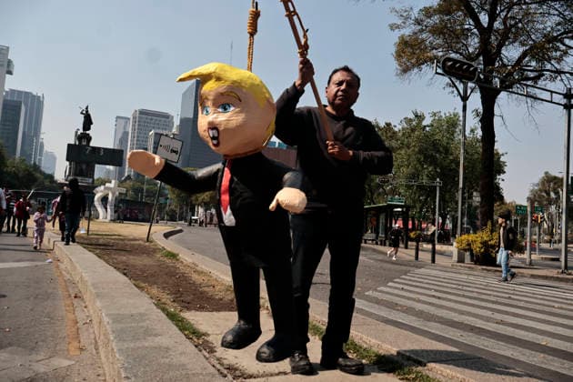 January 10, 2026, Mexico City, Cdmx, Mexico: Mexican protesters and social organizations are demonstrating against the actions of US President DONALD TRUMP against Venezuela and its former president, NICOLAS MADURO. With posters, giant banners, and Venezuelan flags, they are showing their support for MADURO and his vice president, DELCY RODRIGUEZ, who has assumed the presidency due to the country s situation. Chanting slogans like Yankees out of Latin America and Trump, imperialist terrorist, the protesters are demanding the immediate release of NICOLAS MADURO, whom they claim is being held captive by DONALD TRUMP. This comes as protests against these actions spread worldwide, with many believing TRUMP S true objective is to seize V - ZUMAp204 20260110_zip_p204_022 Copyright: xJosuexPerezx