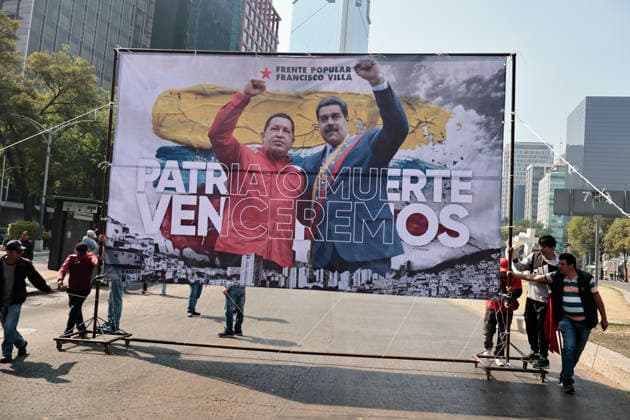 January 10, 2026, Mexico City, Cdmx, Mexico: Mexican protesters and social organizations are demonstrating against the actions of US President DONALD TRUMP against Venezuela and its former president, NICOLAS MADURO. With posters, giant banners, and Venezuelan flags, they are showing their support for MADURO and his vice president, DELCY RODRIGUEZ, who has assumed the presidency due to the country s situation. Chanting slogans like Yankees out of Latin America and Trump, imperialist terrorist, the protesters are demanding the immediate release of NICOLAS MADURO, whom they claim is being held captive by DONALD TRUMP. This comes as protests against these actions spread worldwide, with many believing TRUMP S true objective is to seize V - ZUMAp204 20260110_zip_p204_023 Copyright: xJosuexPerezx