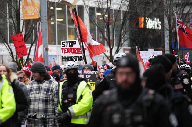 11 arrested at anti-immigration rally and counter-demonstration in Toronto TORONTO, CANADA - JANUARY 10 : Participants wave Canadian flags as they gather for Canada First rally in Toronto, Ontario on January 10, 2026. Canada First protestors and counter demonstrators gathered at Nathan Phillips Square and marched in downtown Toronto. Clashes broke out between police and protesters, eleven protesters arrested. Mert Alper Dervis Anadolu Ontario Canada. Editorial use only. Please get in touch for any other usage.  Copyright: x2026xAnadoluxMertxAlperxDervisx