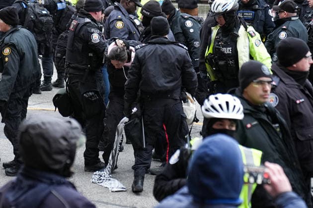 11 arrested at anti-immigration rally and counter-demonstration in Toronto TORONTO, CANADA - JANUARY 10 : Police detain protestors as opposition group and anti-immigration protestors march in downtown Toronto, Ontario on January 10, 2026. Canada First protestors and counter demonstrators gathered at Nathan Phillips Square and marched in downtown Toronto. Clashes broke out between police and protesters, eleven protesters arrested. Mert Alper Dervis Anadolu Ontario Canada. Editorial use only. Please get in touch for any other usage.  Copyright: x2026xAnadoluxMertxAlperxDervisx