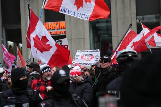 11 arrested at anti-immigration rally and counter-demonstration in Toronto TORONTO, CANADA - JANUARY 10 : Participants wave Canadian flags as they gather for Canada First rally in Toronto, Ontario on January 10, 2026. Canada First protestors and counter demonstrators gathered at Nathan Phillips Square and marched in downtown Toronto. Clashes broke out between police and protesters, eleven protesters arrested. Mert Alper Dervis Anadolu Ontario Canada. Editorial use only. Please get in touch for any other usage.  Copyright: x2026xAnadoluxMertxAlperxDervisx