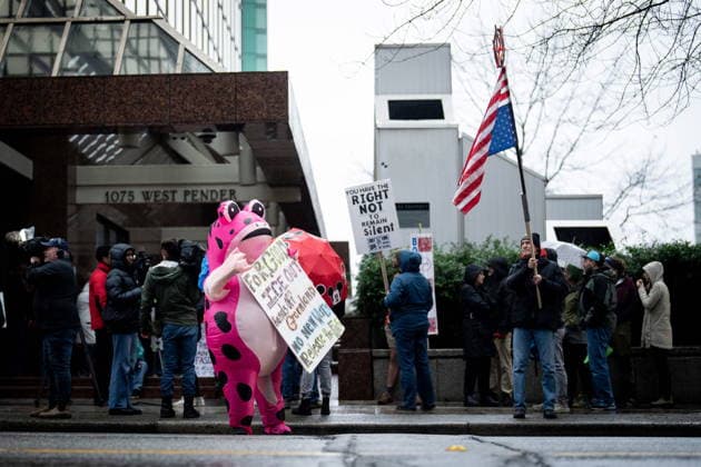 January 11, 2026, Vancouver, Bc, CANADA: People gather during an Ice Out For Good rally outside of the U.S. Consulate General office in Vancouver, on Sunday, January 11, 2026. Vancouver CANADA  - ZUMAc35_ 20260111_zaf_c35_035 Copyright: xEthanxCairnsx