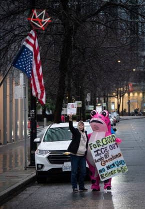 January 11, 2026, Vancouver, Bc, CANADA: People demonstrate during an Ice Out For Good rally outside of the U.S. Consulate General office in Vancouver, on Sunday, January 11, 2026. Vancouver CANADA  - ZUMAc35_ 20260111_zaf_c35_039 Copyright: xEthanxCairnsx