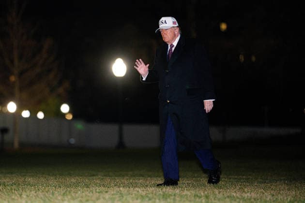 President Trump walks on the South Lawn - DC US President Donald Trump walks on the South Lawn of the White House after arriving on Marine One in Washington, DC, US, on Sunday, Jan. 11, 2026. Appropriators rejected several of President Donald Trump s proposed cuts to international aid programs under a bipartisan funding bill released Sunday. Photo by Aaron Schwartz Pool ABACAPRESS.COM Washington District of Columbia  Copyright: xPool ABACAx