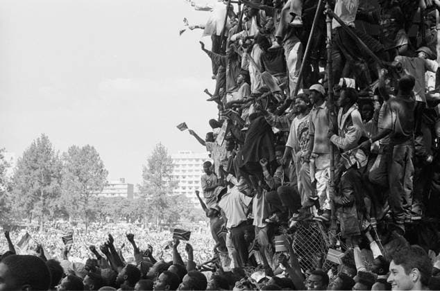May 10, 1994, Pretoria, Gauteng, South Africa: People celebrate the beginging of democracy in South Africa at the Union Building during the inorgeration of Nelson Mandela, South Africa s first democratically ellected president. 10 May, 1994, Pretoria, South Africa. Pretoria South Africa - ZUMArb1_ 19940510_zip_rb1_001 Copyright: xJohnxRobinsonx