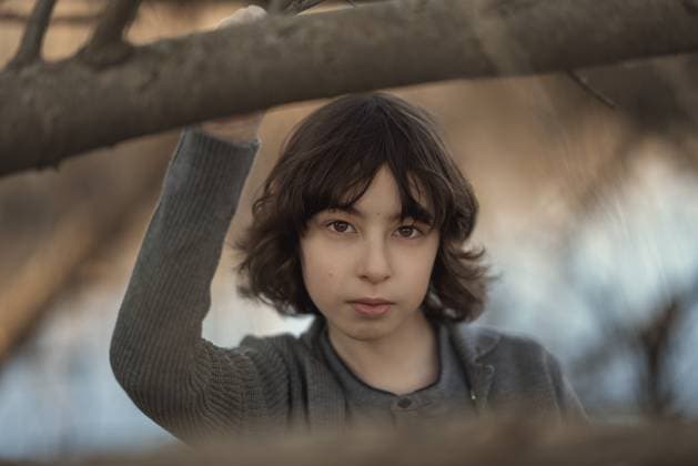 Porträt eines gutaussehenden Jungen auf einem Hintergrund der Natur. Nahaufnahme des Gesichts Portrait of a handsome boy on a background of nature. Face close-up Copyright: imageBROKER SergeyxKohl ibxiqx15991701.jpg ,model released, Symbolfoto ,property released