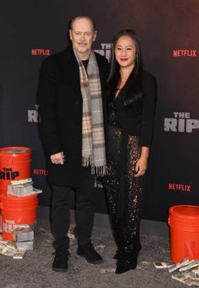 NEW YORK, NY - JANUARY 13: Steve Buscemi and Karen Ho at the Netflix World premiere of The Rip at Alice Tully Hall on January 13, 2026 in New York City. Copyright: xMediaPunchx