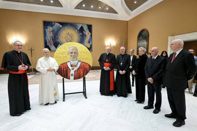Mosaic Portrait of Pope Leo XIV for St. Paul Outside the Walls Basilica - Vatican In keeping with tradition, the Vatican Mosaic Studio shows the mosaic portrait of Pope Leo XIV destined for the Basilica of St. Paul Outside the Walls (Rome) on January 14, 2026, Vatican. In accordance with the ancient tradition that accompanies the election of every Pope, just over eight months after the election of Pope Leo XIV, the Vatican Mosaic has completed the mosaic portrait destined for the Basilica of Saint Paul Outside the Walls in Rome. The mosaic roundel, with a diameter of 137 centimeters, was created using glass enamels and gold on a metal structure at the studio of the Fabric of Saint Peter. The work will be installed in the space next to the p  Copyright: xABACAx
