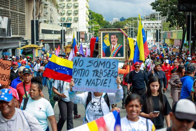 Pro-Maduro supporters march in Caracas CARACAS, VENEZUELA - JANUARY 14: Workers from various sectors take part in a march in support of President Nicolas Maduro in Caracas, Venezuela, on January 14, 2026. The demonstration was attended by employees from state-run and private companies, including PDVSA and CANTV, as part of a show of solidarity with the government. Ivan Mc Gregor Anadolu Caracas Venezuela. Editorial use only. Please get in touch for any other usage.  Copyright: x2026xAnadoluxIvanxMcxGregorx