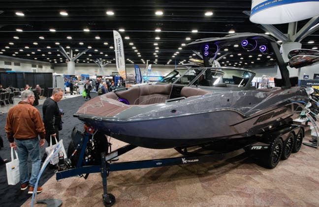 (260115) -- VANCOUVER, Jan. 15, 2026 -- People view a speedboat on display during the Vancouver International Boat Show 2026 at the Vancouver Convention Centre in Vancouver, British Columbia, Canada, Jan. 14, 2026. The five-day show kicked off here on Wednesday, with hundreds of exhibitors from around the world showcasing the latest vessels, marine gears and marine technology. (Photo by Xinhua) CANADA-VANCOUVER-INT L BOAT SHOW 2026 LiangxSen 