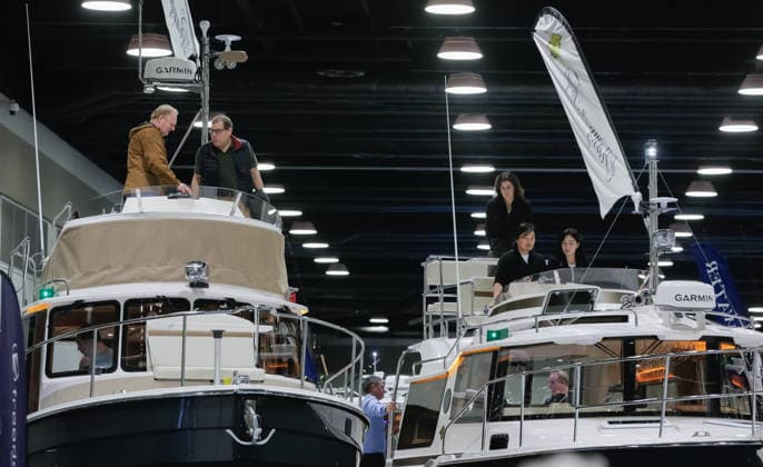 (260115) -- VANCOUVER, Jan. 15, 2026 -- People attend the Vancouver International Boat Show 2026 at the Vancouver Convention Centre in Vancouver, British Columbia, Canada, Jan. 14, 2026. The five-day show kicked off here on Wednesday, with hundreds of exhibitors from around the world showcasing the latest vessels, marine gears and marine technology. (Photo by Xinhua) CANADA-VANCOUVER-INT L BOAT SHOW 2026 LiangxSen 