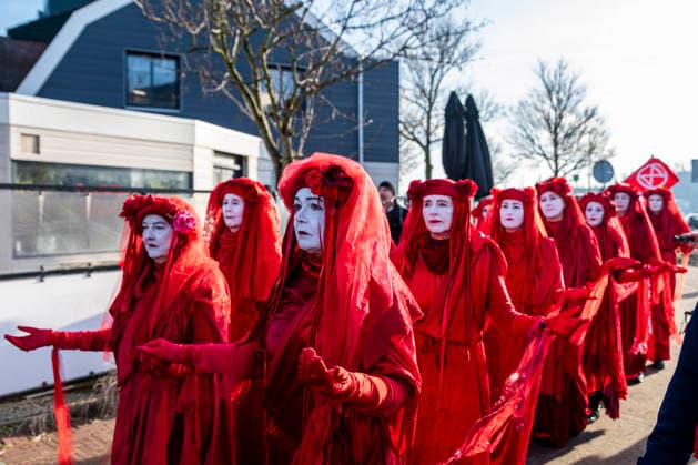 January 17, 2026, Wijk Aan Zee, North Holland, Netherlands: The activist group the Red Rebels joined a protest against Tata Steel. On January 17, 2026, in Wijk aan Zee, the Netherlands, climate activists protested at the Tata Steel Chess Tournamentl. Tata Steel, the sponsor of the tournamentÃ¢â‚¬?dubbed the Ã¢â‚¬oeWimbledon of chess tournamentsÃ¢â‚¬Â?Ã¢â‚¬?had previously set itself the goal of becoming climate neutral by 2025, which it has failed to do. Wijk Aan Zee Netherlands - ZUMAp202 20260117_zip_p202_001 Copyright: xJamesxPetermeierx