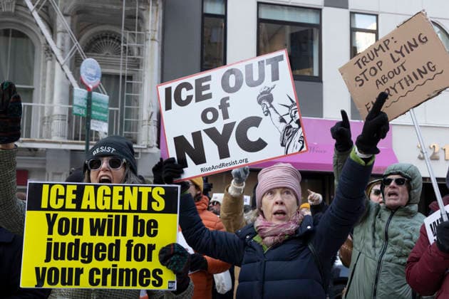 January 19, 2026, New York, New York, USA: Demonstrators holding signs that read ICE AGENTS You will be judged for your crimes ICE OUT OF NYC TRUMP STOP LYING ABOUT EVERYTHING chant and point at 26 Federal Plaza where the offices of U.S. Immigration and Customs Enforcement (I.C.E.) are housed at a rally and march under the banner MLK and Renee Justice Now on Martin Luther King Jr. Day in Lower Manhattan. A coalition of advocacy organizations, joined by community members and elected officials march over the Brooklyn Bridge to Federal Plaza to denounce the killing of R. Good by federal agents and the immigration policies of Trump administration. New York USA - ZUMAr174 20260119_znp_r174_001 Copyright: xGinaxMxRandazzox