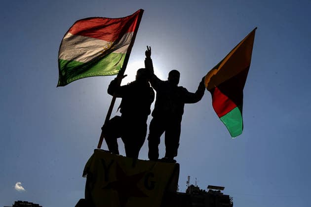 January 20, 2026, Beirut, Beirut, Lebanon: Activists wave Kurdish party flags during a protest to condemn Syrian government military operations against the Syrian Democratic Forces (SDF) in Syria. Hundreds of protestors chanted; Ã¢â‚¬ËœÃ¢â‚¬â ¢Julani, nom de guerre of al-Sharaa, terroristÃ¢â‚¬â ¢Ã¢â‚¬â ¢. A long-standing tension between the Syrian Democratic Forces (SDF) and the post-Bashar al-Assad Syrian transitional government escalated into major armed conflict. Violent clashes erupted around detention facilities holding Islamic State (ISIL) members. The SDF reported that roughly 1,500 ISIL members escaped from Shaddadi prison during the fighting; both sides trade blame for the breach. Beirut Lebanon - ZUMAn313 20260120_zip_n313_011 Copyright: xMarwanxNaamanix