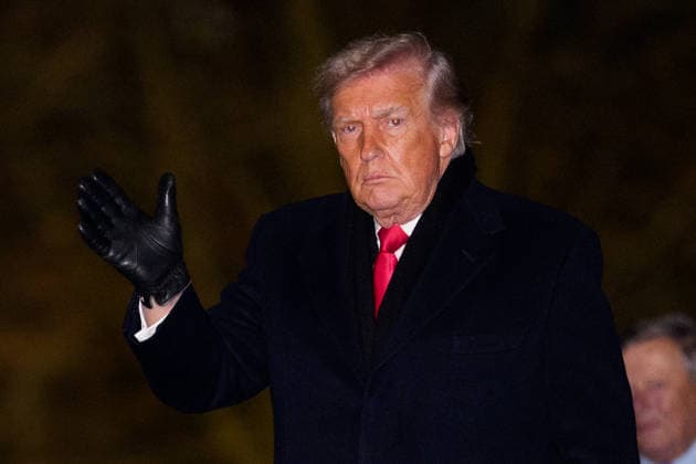 January 20, 2026, Washington, District Of Columbia, USA: United States President Donald J Trump and waves as he arrives at the White House in Washington, DC, USA, on Tuesday, January 20, 2026 Washington USA - ZUMAs152 20260120_faa_s152_009 Copyright: xAaronxSchwartzx-xPoolxviaxCNPx