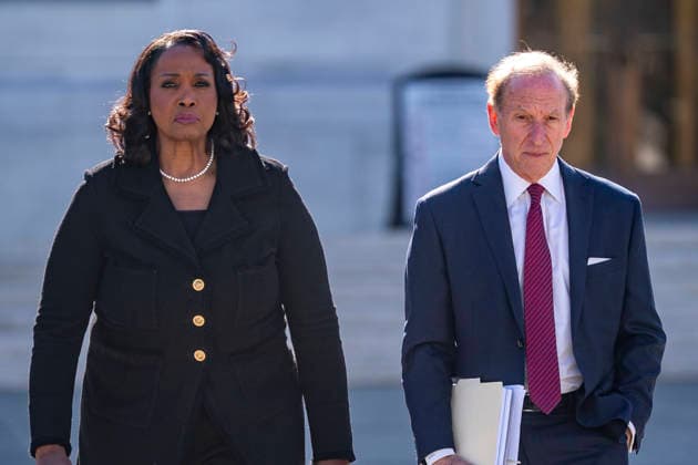 Federal Reserve Governor Lisa Cook (L) and attorney Abbe Lowell leave the United States Supreme Court in Washington, DC on Wednesday, January 21, 2026. The court heard oral arguments in Trump v. Cook, which centers on President Donald Trump s attempt to fire Cook over allegations of mortgage fraud, which she denies.  WAP20260121326 BONNIExCASH