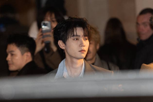 AMI Paris Menswear Arrivals Zhou Yiran arrived at the AMI Paris Menswear Fall Winter 2026-2027 show as part of Paris Fashion Week on January 21, 2026 in Paris, France. Photo by Nasser Berzane ABACAPRESS.COM Paris France  Copyright: xBerzanexNasser ABACAx