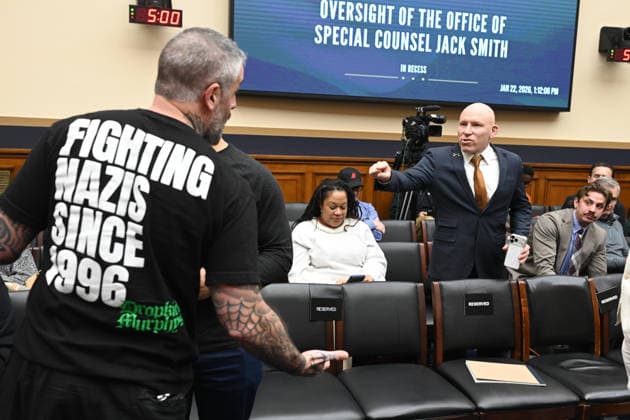 January 22, 2026, Washington, District Of Columbia, USA: Former Capitol Police officer Michael Fanone stands up to address provocative remarks from right wing provocateur and influencer Ivan Raiklin during a break in the House Committee on the Judiciary hearing entitled Oversight of the Office of Special Counsel in the Rayburn House office building in Washington DC, on Thursday January 22, 2026. Fanone™s shirt reads Fighting Nazis Since 1996 which is a slogan of the band the Dropkick Murphys Washington USA - ZUMAs152 20260122_faa_s152_084 Copyright: xMattiexNeretinx