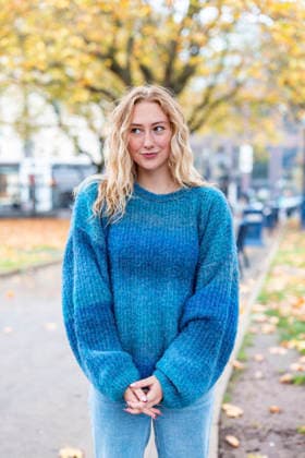 Portrait of smiling woman in blue sweater outdoors in autumn model released, Symbolfoto, WPEF10104