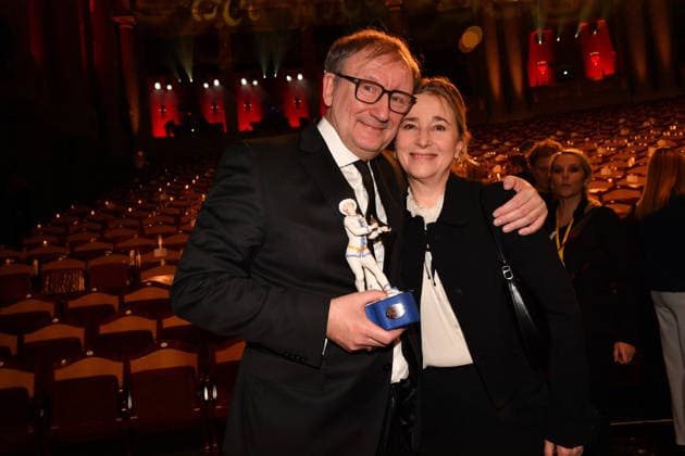 Rainer Bock mit Begleitung 47. Bayerischer Filmpreis Preis, Auszeichnung Party Prinzregententheater München 23. Januar 2026