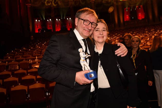 Rainer Bock mit Begleitung 47. Bayerischer Filmpreis Preis, Auszeichnung Party Prinzregententheater München 23. Januar 2026