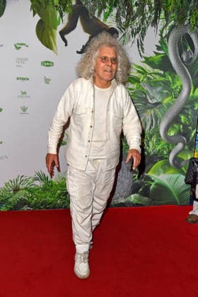 Rainer Langhans bei der TV-Starts der neuen Staffel von Ich bin ein Star Holt mich hier raus! lädt Entertainer und Moderator Julian F.M. Stoeckel am Freitag, dem 23. Januar 2026 zur legendären Dschungelparty in Berlin am 23.01.2026