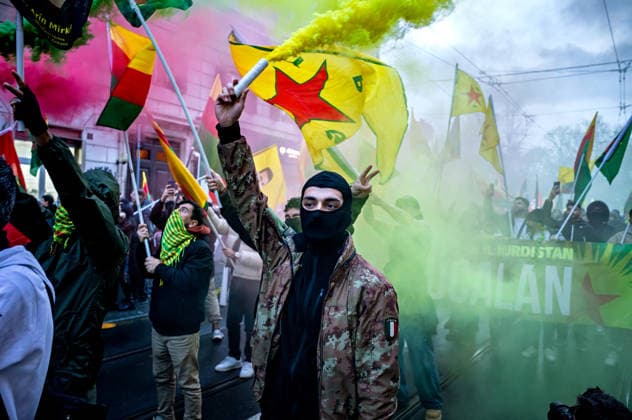 Demonstration for Rojava ROME, ITALY - JANUARY 24: People take part in a demonstration in defence of Rojava, the territories in north-eastern Syria in the Rojava region that remain under the control of the autonomous administration governed by the Kurds, now under attack by the Syrian government troops of Syrian President Ahmad al-Shara, a former member of al-Qaeda on January 24, 2026 in Rome, Italy. Rome Italy Copyright: xStefanoxMontesix