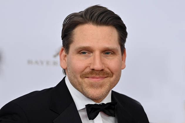 Alex Christensen (Schauspieler) , Einzelbild,angeschnittenes Einzelmotiv,Portraet,Portrait,Porträt. 50.Deutscher Filmball, Roter Teppich,Red Carpet, am 24.01.2026 im H o t e l B a y e r i s c h e r H o f, M u e n c h e n.