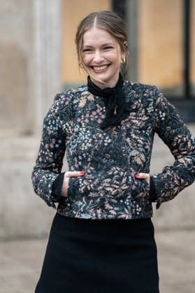 Patou - Outside Arrivals - Paris Fashion Week - Menswear Fall Winter 2026-2027 Camille Razat wears colored floral tapestry jacket with a black velvet bow detail, a black mini skirt, outside Patou Menswear Fall Winter 2026-2027 show as part of Paris Fashion Week on January 25, 2026 in Paris, France., Credit:Lounis Tiar Avalon France, Paris  Copyright: xLounisxTiarx xAvalonx 1069343710