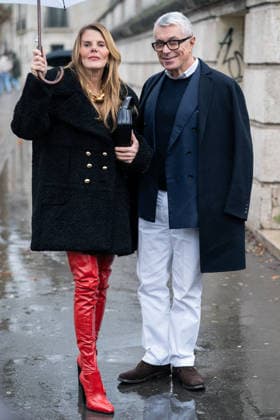 Patou - Outside Arrivals - Paris Fashion Week - Menswear Fall Winter 2026-2027 Anna Dello Russo (L) wears black Patou fur short coat, red over the knees leather boots, black bag, gold chain necklace, and Giorgio Guidotti (R) wears, white shirt, navy sweater, blue blazer, white pants, black coat, brown boots (R), outside Patou Menswear Fall Winter 2026-2027 show as part of Paris Fashion Week on January 25, 2026 in Paris, France., Credit:Lounis Tiar Avalon France, Paris Copyright: xLounisxTiarx xAvalonx 1069344353