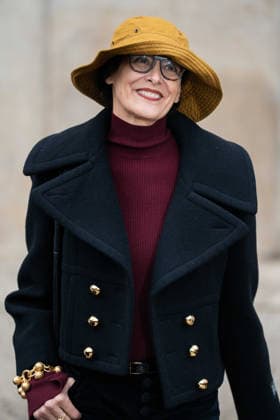 Patou - Outside Arrivals - Paris Fashion Week - Menswear Fall Winter 2026-2027 Ines de la Fressange wears red turtleneck sweater, black pants, black cropped coat, yellow bucket hat, outside Patou Menswear Fall Winter 2026-2027 show as part of Paris Fashion Week on January 25, 2026 in Paris, France., Credit:Lounis Tiar Avalon France, Paris  Copyright: xLounisxTiarx xAvalonx 1069344428