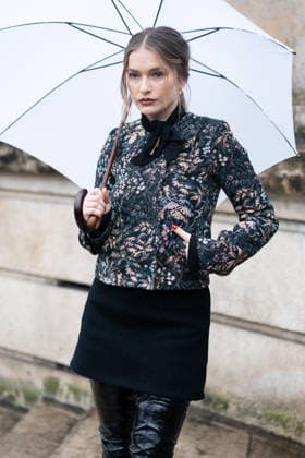 PFW - Patou Arrivals Camille Razat wears colored floral tapestry jacket with a black velvet bow detail, a black mini skirt, outside Patou Menswear Fall Winter 2026-2027 show as part of Paris Fashion Week on January 25, 2026 in Paris, France. Photo by LounisPhotography ABACAPRESS.COM Paris France  Copyright: xLounisPhotography ABACAx