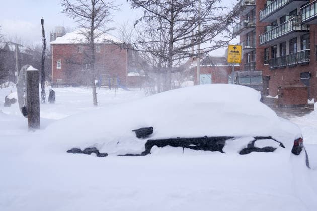 Aftermath of the Snowstorm in Toronto TORONTO, CANADA - JANUARY 26 : A parked car buried in snow after a heavy snowfall in Toronto, Ontario, Canada on January 26, 2026. Mert Alper Dervis Anadolu Ontario Canada. Editorial use only. Please get in touch for any other usage.  Copyright: x2026xAnadoluxMertxAlperxDervisx